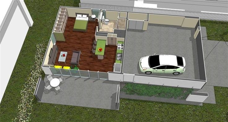 an aerial view of a house with a car parked in the driveway and on the ground