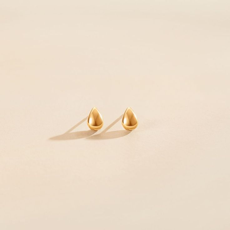 Description: Inspired by water drops that are common in the natural world, a domed design mimics the look of a real water drop. Made with high quality 18k solid yellow gold. Measurement: 6.6 x 4.6 x 3.7 mm. Weight: 0.30 grams Origin: Imported Minimalist Gold Drop Earrings With Matching Set, Minimalist Tarnish-resistant Teardrop Earrings For Formal Occasions, Minimalist Tarnish Resistant Teardrop Earrings For Formal Occasions, 14k Gold Teardrop Earrings For Anniversary, Yellow Gold Pear-shaped Teardrop Earrings With Matching Set, Anniversary Polished Teardrop Earrings, Anniversary Teardrop Drop Earrings With Polished Finish, Anniversary Polished Teardrop Drop Earrings, Polished Teardrop Drop Earrings For Anniversary