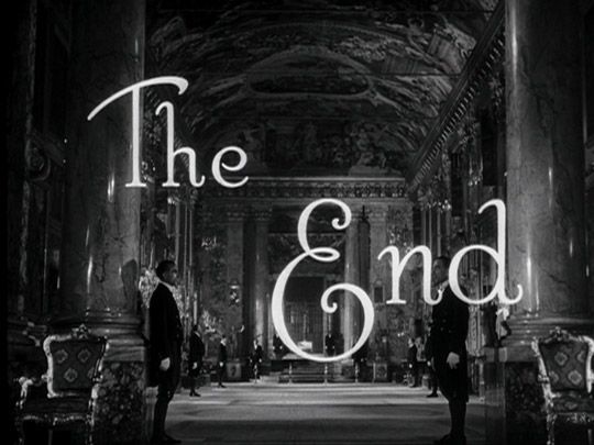 the end movie poster with two men standing in an old building