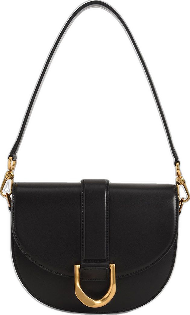 Our most coveted Gabine saddle bag is back this season in an array of updated colourways, including cream, dark green and mustard. The signature black piece, featuring the much-loved classic curved-bottom silhouette and gold-tone buckle accent, is once again designed to be worn and displayed. Makes sense why this line has gained cult following amongst trendsetters such as Yoyo Cao, Lily May Mac and Nara Kim. Roomy enough to hold your daily essentials, this medium-sized gem has a short shoulder s Classic Baguette Bag With Metal Hardware, Classic Baguette Bag With Metal Hardware For Daily Use, Classic Baguette Bag With Gold-tone Hardware For Daily Use, Trendy Saddle Shoulder Bag With Gold-tone Hardware, Everyday Saddle Shoulder Bag With Gold-tone Hardware, Elegant Everyday Saddle Bag With Gold-tone Hardware, Black Saddle Bag With Gold-tone Hardware For Evening, Timeless Black Saddle Bag With Detachable Strap, Chic Black Baguette Bag With Metal Hardware