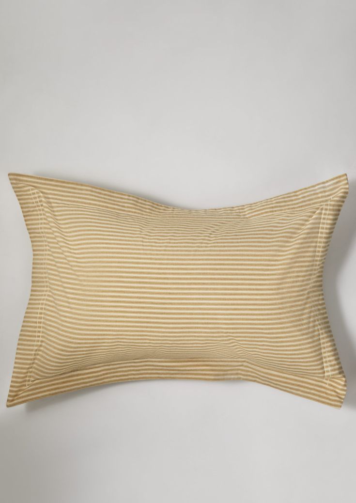 the pillow case is made from ticking fabric