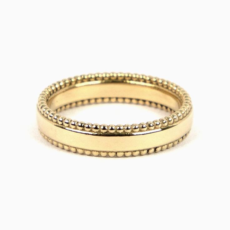 The double seed ring is made with a 4.2mm width to give that classic look with a touch of seed texture. Available in 14k yellow gold, white gold, and rose gold. Perfect by itself or added to a stack. Luxury Stackable Rings With Thick Band For Wedding, Classic Rings With Diamond Cut And Thick Band, Classic Ring With Diamond Cut And Thick Band, Classic Thick Band Ring With Diamond Cut, Classic Thick Band With Diamond Cut, Classic Stackable Promise Rings With Decorative Band, Timeless Ring With Decorative Band For Promise, Timeless Promise Ring With Decorative Band, Classic Stackable Eternity Band For Promise