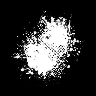 an abstract black and white background with splatters in the center on a dark background