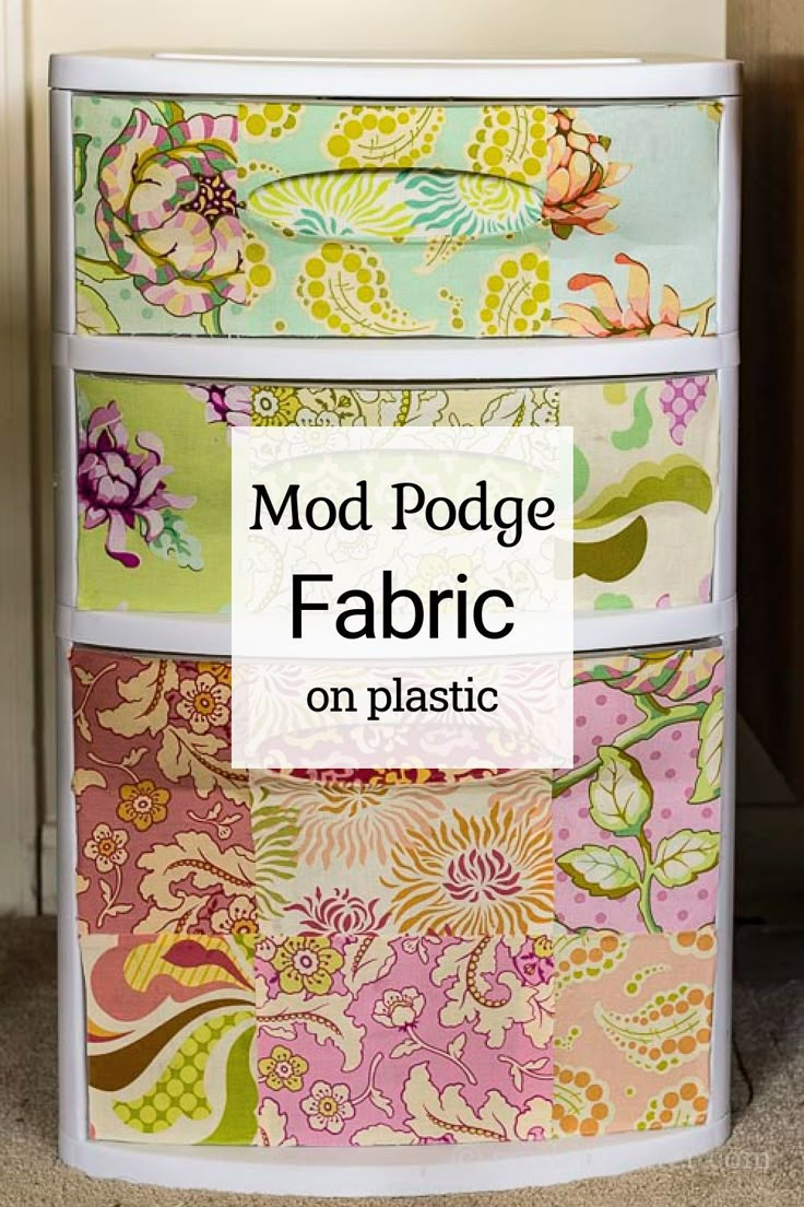 an old dresser has been transformed into a colorful fabric storage bin with the words mod podge fabric on it