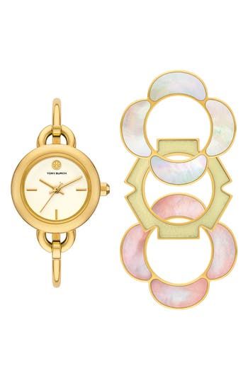 Stacked double-T logos punctuate a slender bangle watch that can be taken up a notch with three interchangeable, flower-shaped top rings in an array of shapes and colors. 27mm case; 5mm band width Includes watch and three interchangeable top rings Quartz movement Mineral crystal face Stainless steel with goldtone plate/mother-of-pearl/epoxy Imported Wedding Watch For Bride, Designer Watches Women, Tory Burch Watch, Womens Designer Watches, Watch Set, Bangle Watches, Watch Gift, Top Rings, Stainless Steel Bangles