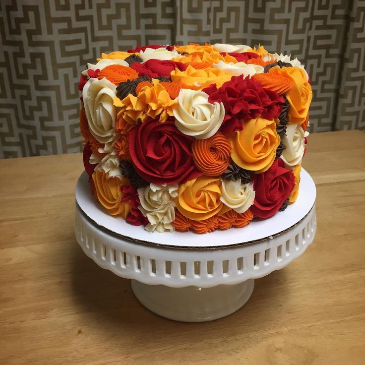 there is a cake that has been decorated with flowers