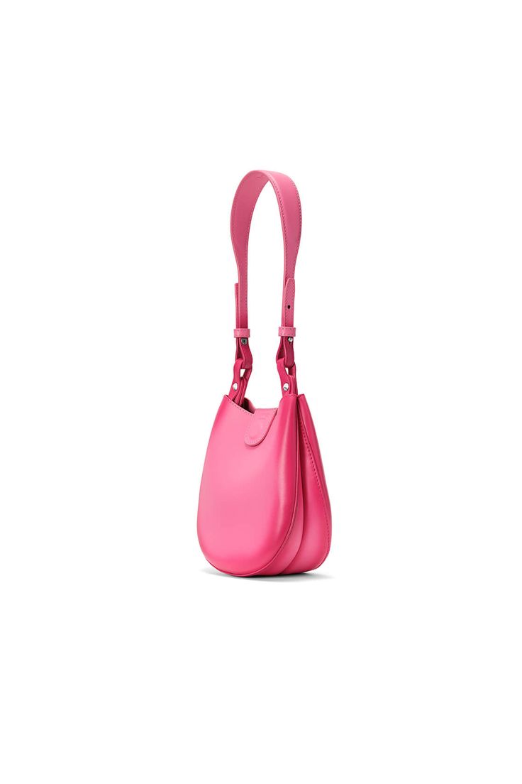 Matte blush calfskin small saddle bag Hot pink oil-edge, threading, and lining details Fold-over flap with magnetic closure Embossed logo Two leather straps of different lengths: a short one for side-shoulder baguette carry, and a long one for crossbody carry One bonus inner pouch, detachable with a chain -------------- Bag size: approximately 7.5” W x 7” H x 3” D (19 cm x 17.5 cm x 7.5 cm) One shorter adjustable leather strap with a drop of approximately 8.5" to 9.5" (22 cm to 24 cm) One longer Pink Bags With Leather Lining For Daily Use, Pink Bags With Leather Lining For Everyday Use, Everyday Pink Bags With Leather Lining, Pink Everyday Bags With Leather Lining, Pink Leather-lined Satchel Bag, Chic Pink Calf Leather Bag, Pink Calf Leather Bag With Detachable Strap, Pink Leather Shoulder Bag With Leather Lining, Classic Pink Leather Bag