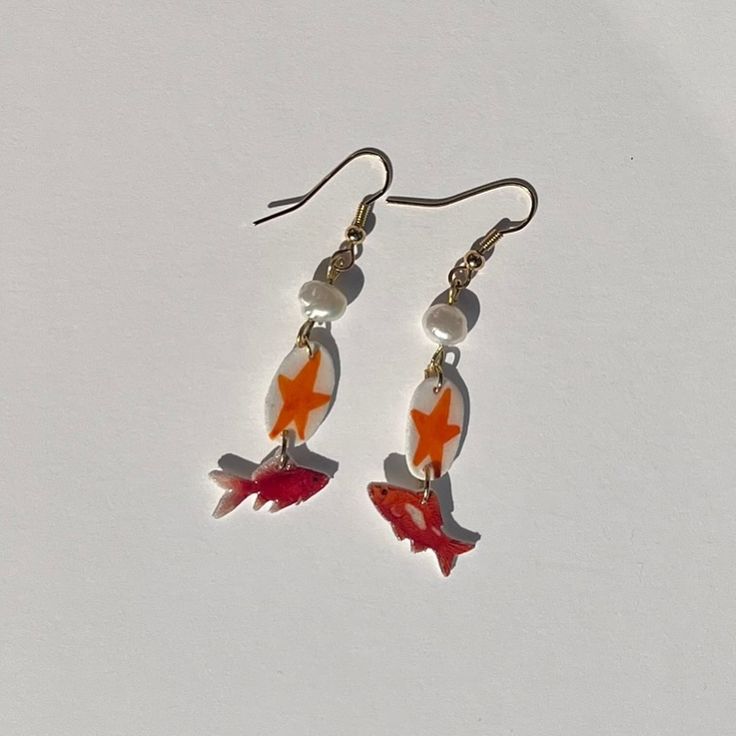 🎏 Go Fish! ——— Handcrafted by Rachel! ~SOLD! DM if want something similar~ #jewelry #handmadejewelry #earrings #charms #craft Clay Fish Earrings, Art Stall, Clay Fish, Jewellery Dish, Fish Earrings, Jewelry Piercing, Earrings Charms, Funky Earrings, Body Jewelry Piercing