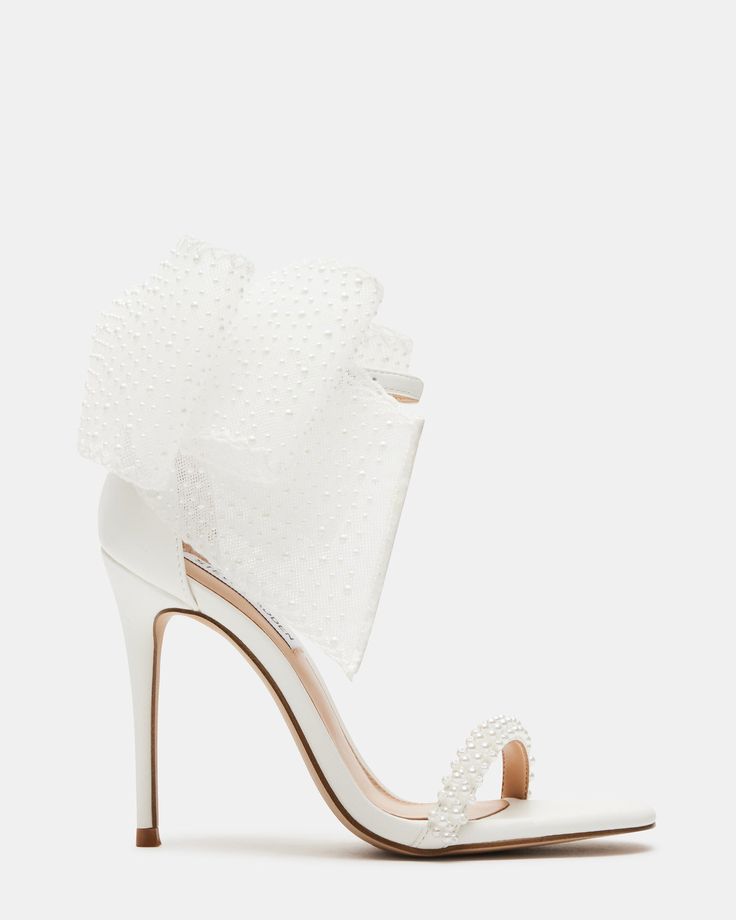 BENNI WHITE Silver Bridal Shoes, Bridal Era, Pearl Heels, Steve Madden High Heels, Pearl Ornaments, Statement Shoes, Steve Madden Store, Pearl Bow, Wedding 2025