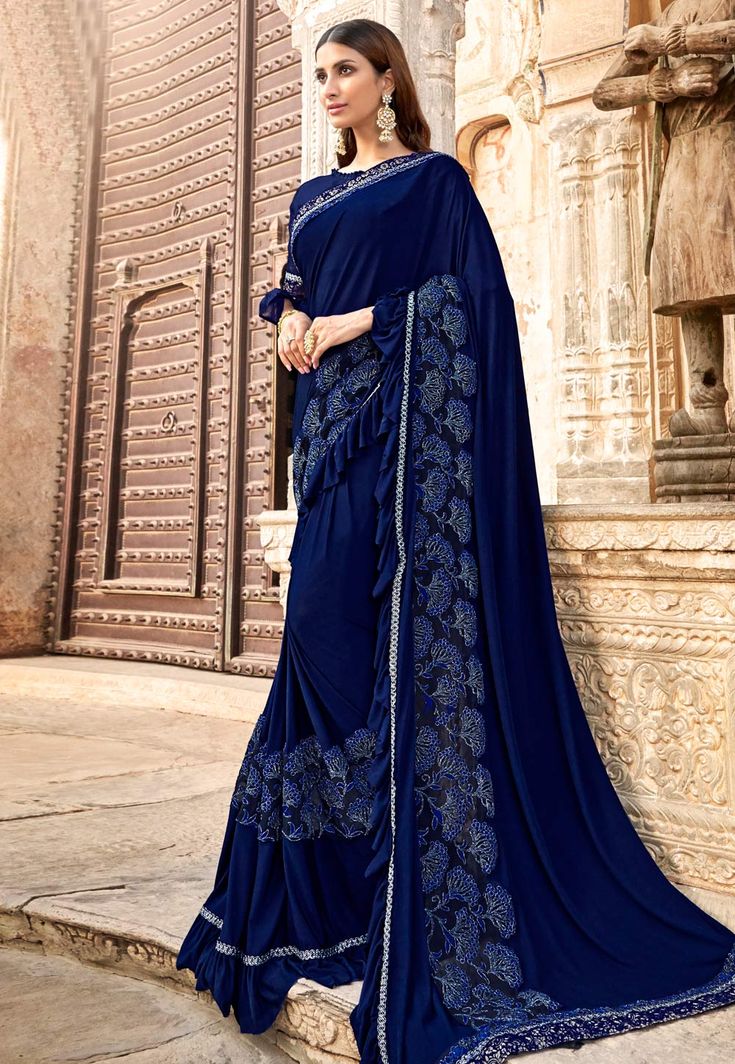 Navy blue jacquard silk saree with blouse 38325  Desc:  Color : Navy Blue Fabric : Jacquard Silk Work : Thread Wash Care : Dry clean Sleeve Style : Quarter Sleeve Long Sleeves : Done only in Custom Stitch Sleeves Lining : Done only in Custom Stitch Bust Size : 32 to 42 Inches Occasion : Festival   Diwali   Eid   Durga Pooja   Ganesh Charturthi   Dussehra. With Express Free Shipping and Custom Stitching, Buy Indian Wedding Party Wear Saree Navy blue jacquard silk saree with blouse 38325 online in Saree Navy Blue, Indian Wedding Party, Latest Saree Trends, Bollywood Designer Sarees, Ruffle Sarees, New Saree Designs, Wedding Party Wear, Ruffle Saree, Party Wear Saree