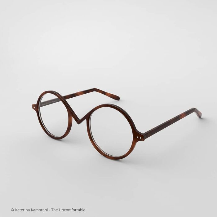 a pair of round glasses on a white background with the lens partially closed to show the frame