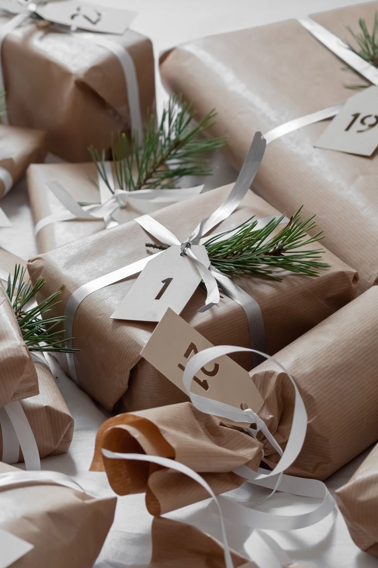 presents wrapped in brown paper and tied with white ribbon