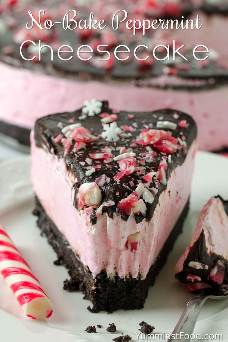 a slice of no bake peppermint cheesecake on a plate with a candy cane