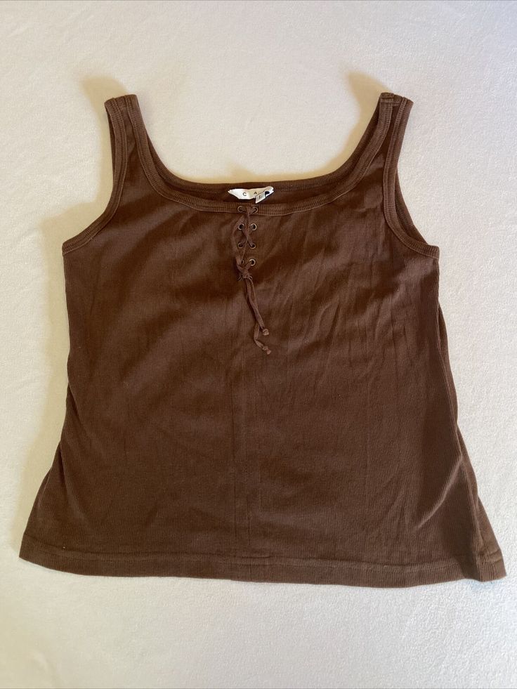 A solid item.  Best offers considered.  Free shipping Free returns Brown Cotton Y2k Top, Trendy Brown Cotton Tank Top, Brown Y2k Tops For Summer, Brown Y2k Style Summer Tops, Y2k Style Cotton Tank Vest, Sleeveless Brown Cotton Top, Brown Sleeveless Cotton Top, Y2k Style Cotton Tank Top For Spring, Brown Cotton Tank Top For Spring