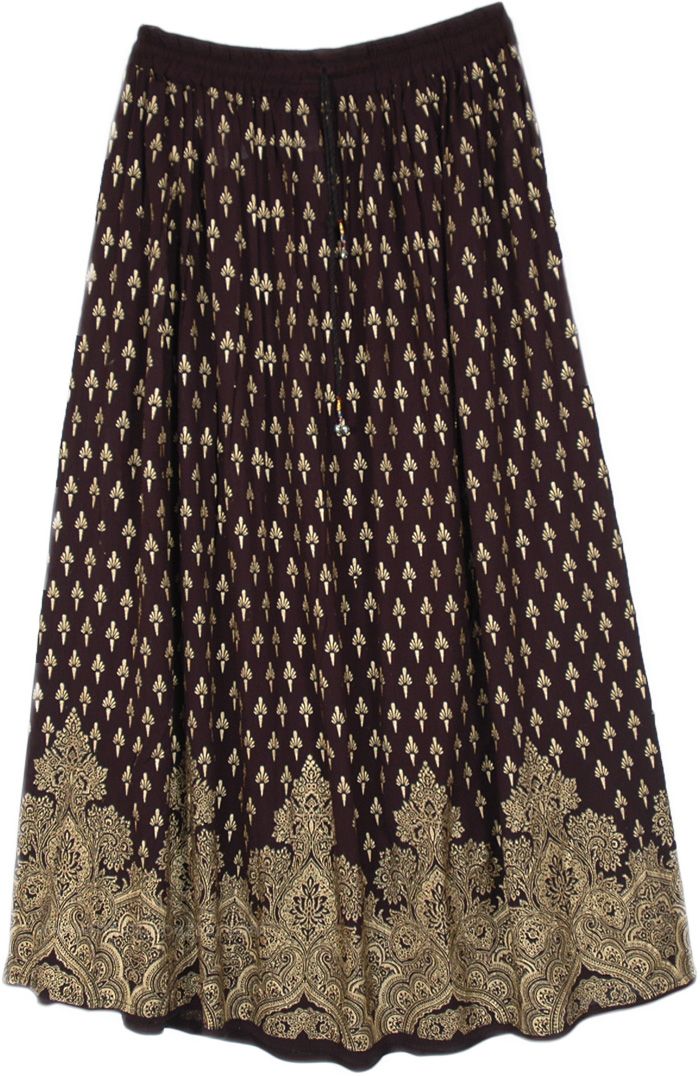 Giving a belly dance vibe, its dreamy look is completed with a dark deep black background highlighted with golden motifs all over.  The golden pattern is delicately ornamental on the bottom of the skirt giving way to a starry sky upwards, which gives a very glamourous effect. #tlb #Bells #vacationclothing #Dance #Floral #Printed #RayonBlackSkirt #BellyDanceSkirt #ComfortableFlowySkirt Bohemian Gold Lehenga For Festivals, Bohemian Gold Lehenga For Festive Occasions, Bohemian Gold Lehenga For Diwali, Festive Gold Long Skirt, Festive Long Gold Skirt, Gold Bohemian Lehenga For Festivals, Traditional Gold Skirt For Festivals, Gold Skirt For Festivals, Traditional Harem Skirt For Festivals