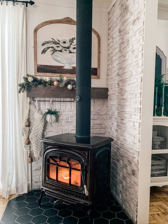 a wood burning stove in the corner of a room