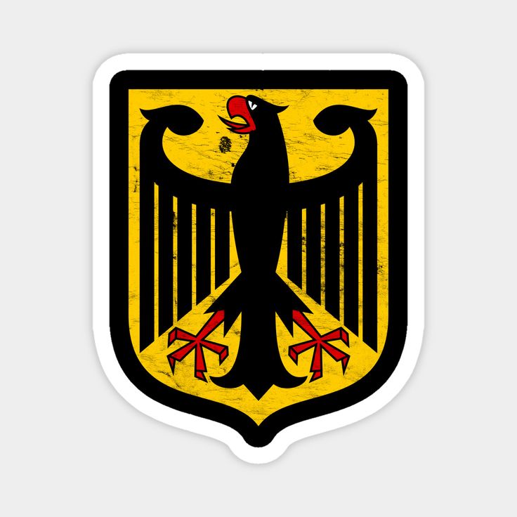 the german eagle emblem is painted on a white background with black and yellow stripes,