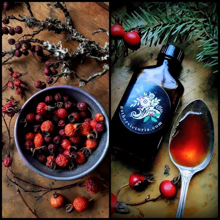 a bowl of berries next to a bottle of syrup