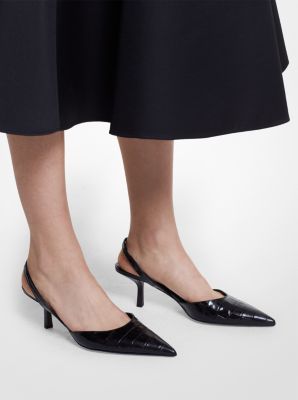 The Italian-made Holly pump is an effortlessly chic finish to any ensemble. An iconic style from the Spring/Summer ’22 runway this slingback pair is designed in a leg-lengthening pointed-toe silhouette and set on a stacked kitten heel for all-day allure. Take a cue from the show and wear them with one of the season’s vintage circle skirts. Luxury Kitten Heels With 4-inch Almond Toe, Michael Kors Black Pointed Toe Heels, Black Slingback Pumps With Pointed Toe, Medium Width, Elegant Michael Kors 4-inch Heels, Luxury Brown Slingback Pumps With 4-inch Heel, Circle Skirts, Summer 22, Iconic Style, Kitten Heel