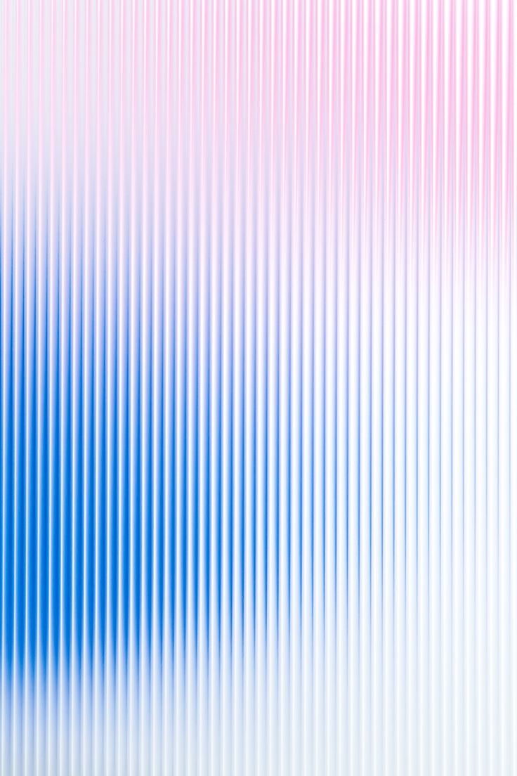 a blue and pink background with vertical lines