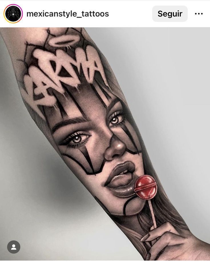 a woman's arm with the word mama on it and a red lollipop in her mouth