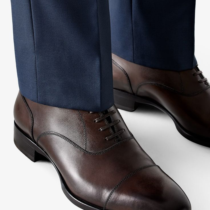 The classic finishing touch to a formal look, these brown Oxfords are crafted in Italy from supple Italian calf leather in a Blake stitch, and feature full leather lining and sole. Office Leather Shoes Goodyear Welted In Calf Leather, Masculine Formal Leather Shoes With Leather Sole, Goodyear Welted Calf Leather Office Shoes, Bridle Leather Cap Toe Oxfords For Business, Brown Bridle Leather Dress Shoes With Leather Lining, Classic Formal Bridle Leather Shoes, Elegant Brown Bridle Leather Boots, Fitted Oxford Leather Shoes With Goodyear Welt, Formal Cognac Oxfords With Goodyear Welt