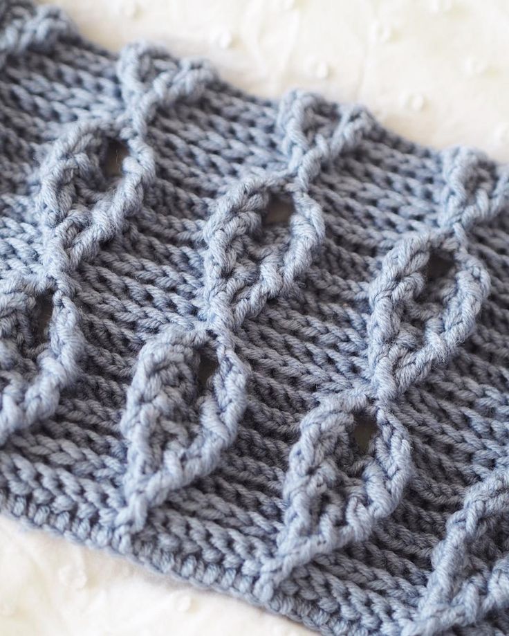 a close up of a knitted object on a table