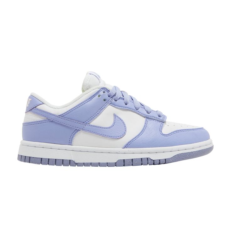 Find NIKE Wmns Dunk Low Next Nature 'lilac on Editorialist. The Nike Women’s Dunk Low Next Nature ‘Lilac’ features pastel accents on a sustainable build that incorporates 20% recycled content by weight. The upper pairs a smooth white leather base with tumbled leather overlays in lavender. Nike’s pinwheel logo decorates a breathable mesh sockliner finished in Nike’s eye-catching Volt hue. Underpinning the sneaker is a traditional rubber cupsole that combines white sidewalls with a speckled rubber outsole made in part with Nike Grind. Purple Sneakers With Rubber Sole For Streetwear, Purple Low-top Sneakers With Rubber Sole, Purple Lace-up High-top Sneakers For Light Sports, Purple Low-top Skate Shoes For Sports, Sporty Lavender Sneakers With Rubber Sole, Lavender Sporty Sneakers With Rubber Sole, Nike Lavender Sneakers For Streetwear, Purple Low-top Basketball Shoes, Casual Purple High-top Sneakers For Light Sports