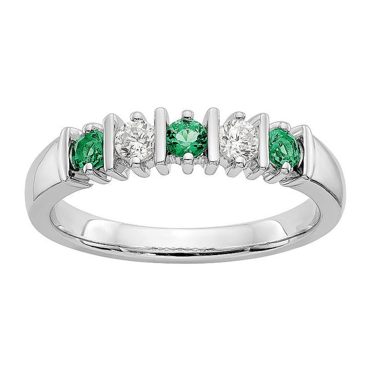 three stone emerald and diamond ring in white gold