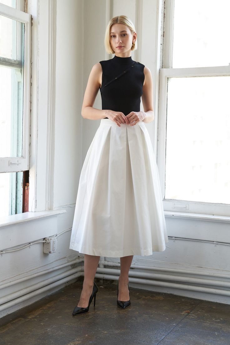 A solid woven full skirt with side zipper closureDetails:Self : 100% PolyesterSize & Fit- Model is 5`9" And Wearing Size Small- Measurements Taken From Size Small- Approx. Length: 35" Chic White A-line Pleated Skirt, White Relaxed A-line Skirt, White Pleated A-line Skirt, White A-line Lined Skirt, White A-line Gathered Skirt, White Pleated Skirt For Party, White A-line Skirt, Elegant White Pleated Gathered Skirt, Elegant White Gathered Pleated Skirt