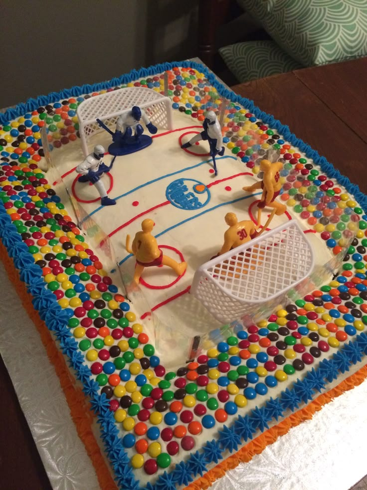 a cake that is decorated like a hockey rink