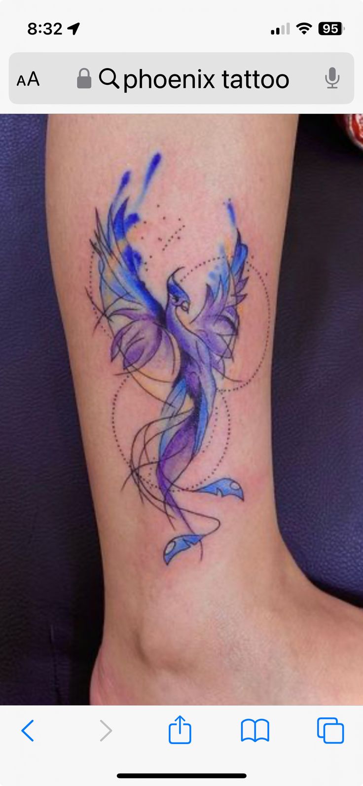 a tattoo on the leg of a woman with blue and purple ink flying through the air