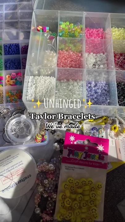 several plastic containers filled with different types of beads