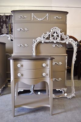 an antique dresser and mirror are shown in this image, with the white paint on it's drawers