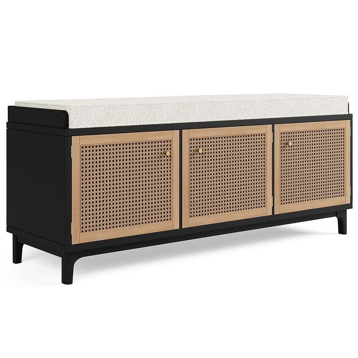 the sideboard is made out of wood and has an upholstered pattern on it