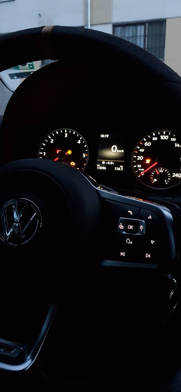 the interior of a car with dashboard lights and gauges