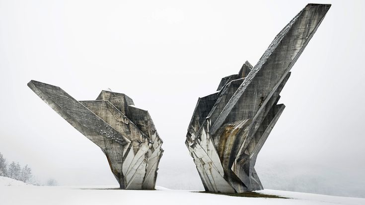 two large rock formations in the snow