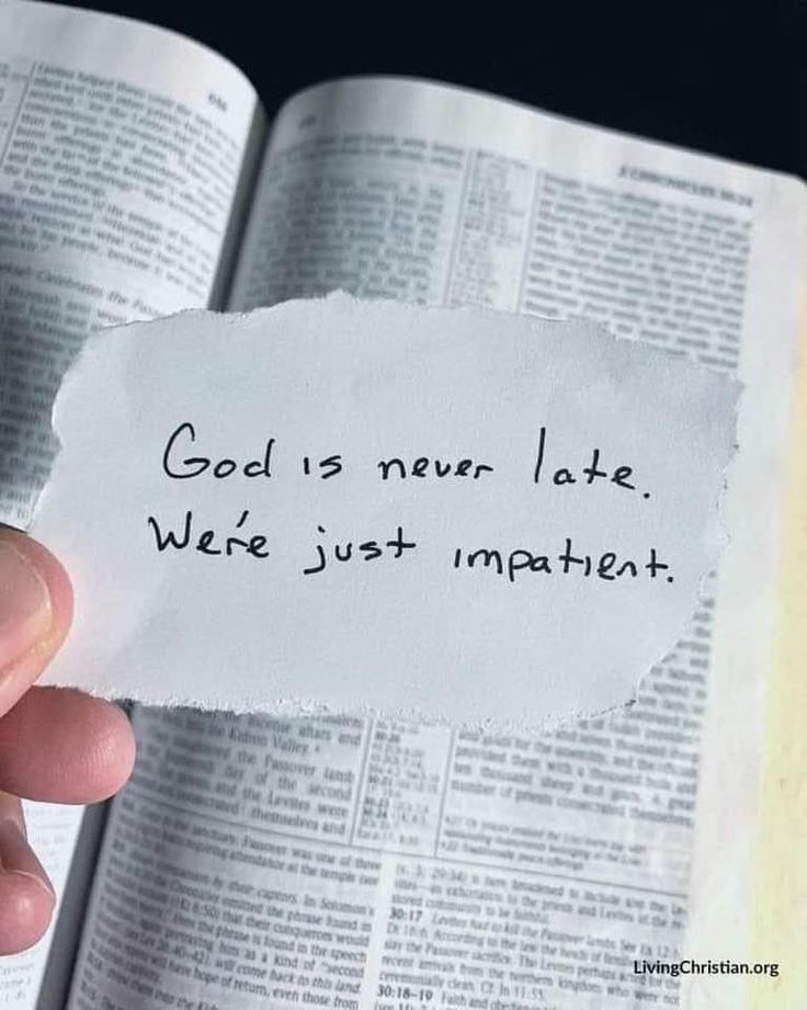 someone holding up a piece of paper that says god is never late we're just impatient