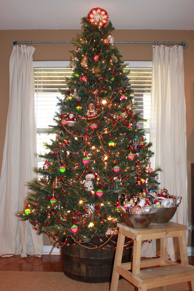 a decorated christmas tree in a living room