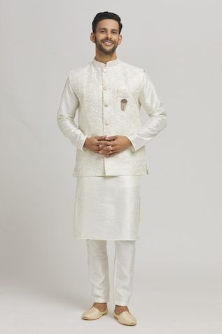 Cream bundi with thread embroidered peacock patterns and sequin work embellishments. Comes with inner kurta and pant. - Aza Fashions Nehru Jacket With Chikankari Embroidery For Diwali Reception, Nehru Jacket With Zari Work For Diwali, Traditional Nehru Jacket With Pallu For Reception, Chanderi Nehru Jacket With Chikankari Embroidery For Reception, Chikankari Embroidery Chanderi Nehru Jacket For Reception, Art Silk Nehru Jacket With Resham Embroidery For Diwali, Resham Embroidered Art Silk Nehru Jacket For Diwali, Chikankari Embroidery Nehru Jacket For Reception, Fitted Cream Nehru Jacket With Resham Embroidery