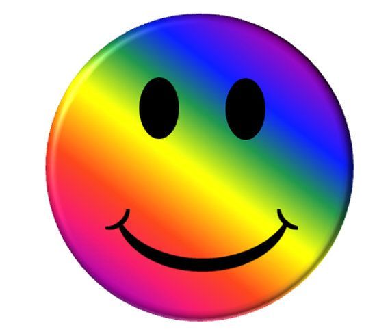 a rainbow colored smiley face with black eyes