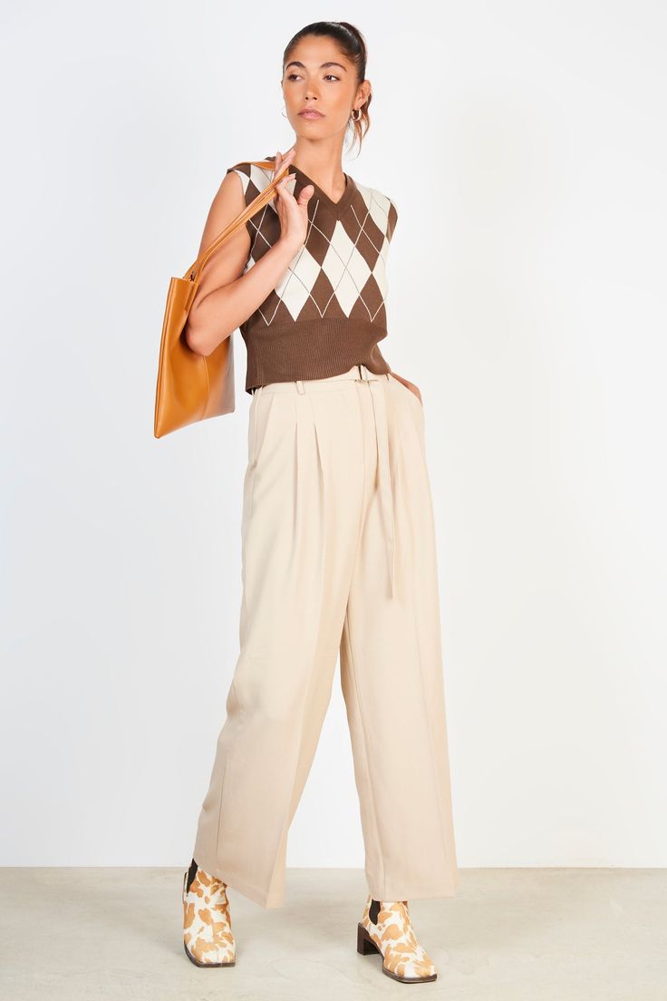 These beige pleated long trousers offer an understated look with cool sophistication. Enjoy the smooth fabric and impeccable tailoring that will make these trousers a staple in your wardrobe for years to come. - Extra long belt - Classic, timeless style - Quality fabric and impeccable tailoring Tailoring Measurements, Belted Trousers, Jeans Uk, London Free, Long Trousers, Timeless Style, Extra Long, Quality Fabric, Timeless Fashion