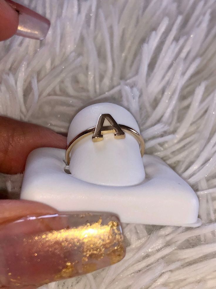 This beautiful genuine solid gold initial ring is the best addition to any ladies collection of precious jewelry. For birthday anniversary wedding engagement Christmas valentines and more These are Brand New 10K Real Yellow Gold Stamp : 10K Real Gold Approx Grams 1.01 Material: 10k Genuine Gold Size 7 Can be sized for an additional $45 per size 100% Authentic GOLD not plated Not refundable White Initial Ring Perfect For Gift, White Initial Ring As A Gift, Gold Monogram Initial Ring In Fine Jewelry Style, White Initial Ring For Gift, 14k Gold Initial Ring For Mother's Day Anniversary, Personalized Initial Ring In White For Anniversary, Personalized White Initial Ring For Anniversary, 14k Gold Monogram Jewelry For Anniversary, White Initial Ring For Anniversary