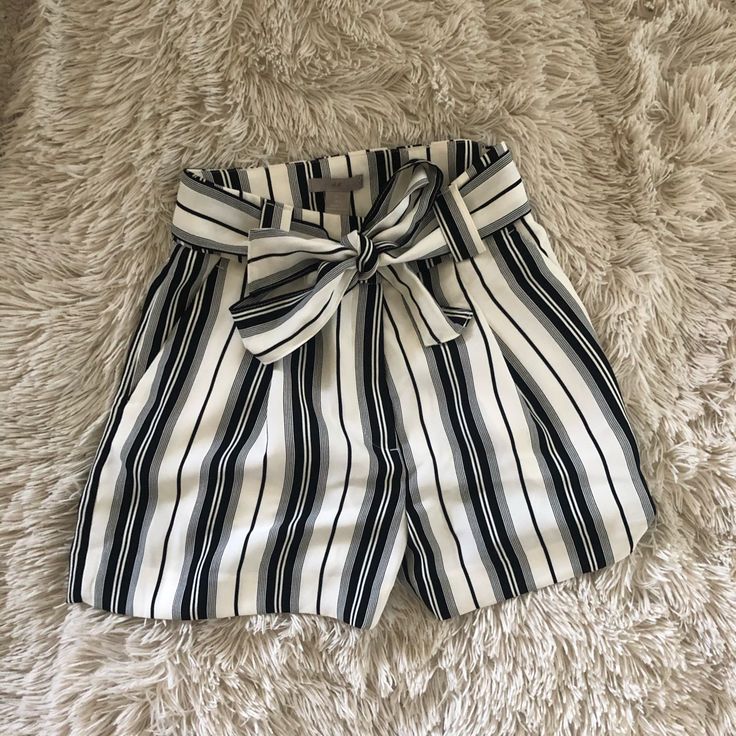 H&M. White High-Waisted, Black-Striped Shorts. Loose & Flowy. Super Comfortable. Cute Removable Tie Belt. Never Worn. Gained Some Weight, So They Don’t Fit Me Anymore. White Shorts With Banded Waist For Summer, Summer White Shorts With Banded Waist, White Summer Shorts With Banded Waist, Chic Striped Shorts With Elastic Waistband, Chic High Waist Striped Shorts, Trendy Banded Waist Shorts, Trendy Short Bottoms With Banded Waist, Chic Striped High-waisted Shorts, Casual White Shorts With Banded Waist