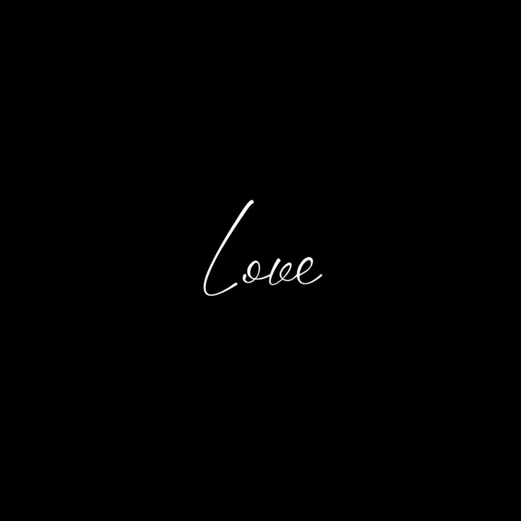 the word love written in cursive writing on a black background