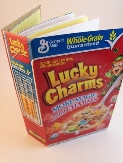 a box of lucky charms cereal sitting on top of a table