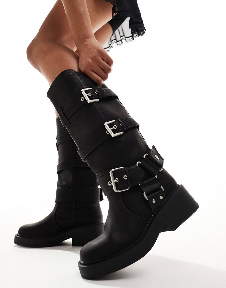 Edgy Knee-high Boots With Buckle For Fall, Black Wide Calf Moto Boots With Buckle, Punk Knee-high Moto Boots For Winter, Casual Knee-high Moto Boots With Buckle, Edgy Knee-high Moto Boots With Buckle, Black Wide Calf Moto Boots With Buckle Closure, Black Punk Style Knee-high Boots With Buckle, Edgy Knee-high Boots With Buckle Closure, Black Punk Knee-high Boots With Buckle