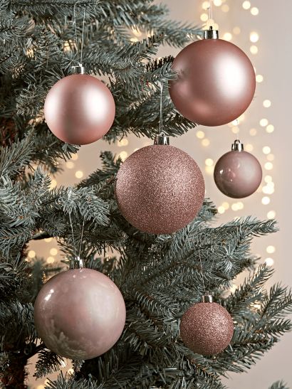 a christmas tree with ornaments hanging from it