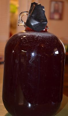 a large brown jug sitting on top of a table