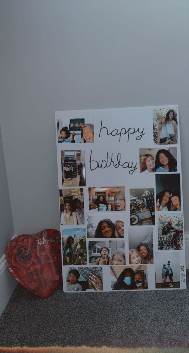 a happy birthday card with photos on it next to a heart shaped box and other items